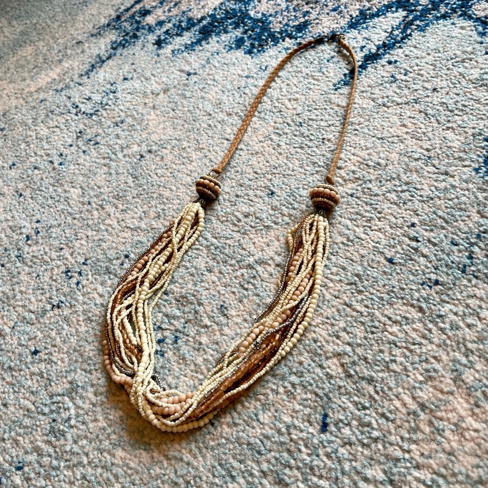 Anthropologie long layered bead necklace in neutral/pinkish hues
